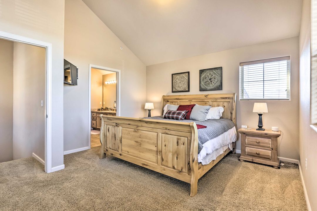 Upstairs king bedroom with vaulted ceiling in the Fraser Colorado condo