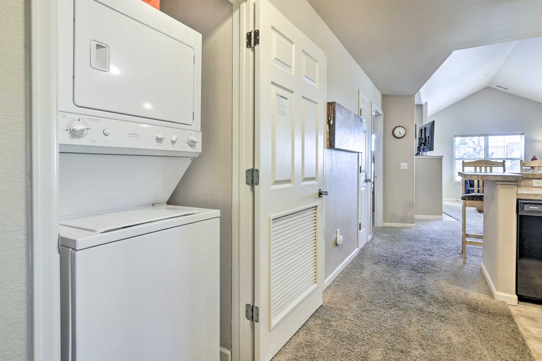 In-unit stacked washer and dryer in the Fraser vacation rental